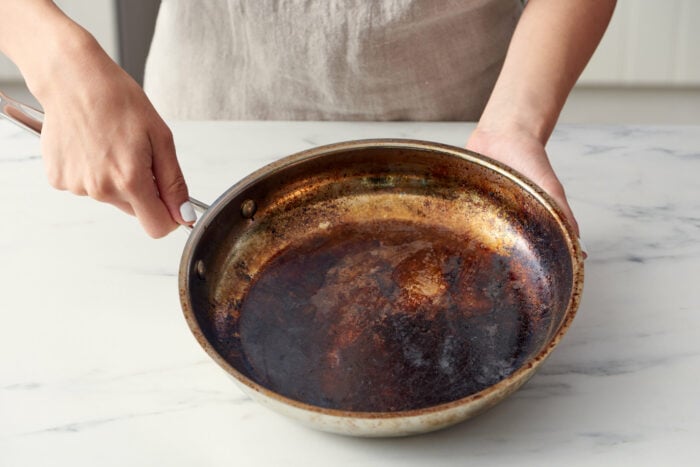 How to clean soot on a frying pan