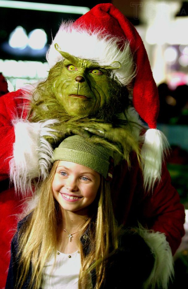 Джим Керрі та зовсім юна Тейлор Момсен / © Associated Press