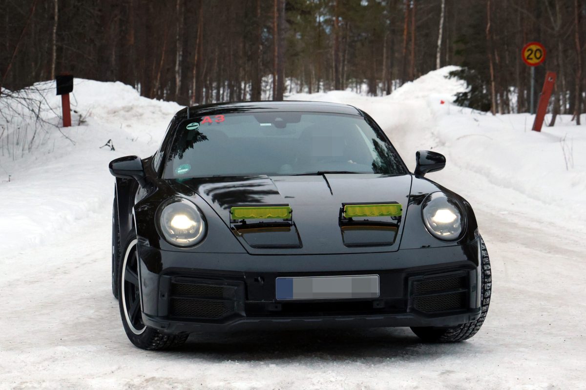 Porsche готує друге покоління 911 Dakar: шпигунські фото гібридного спорткара - фото 5